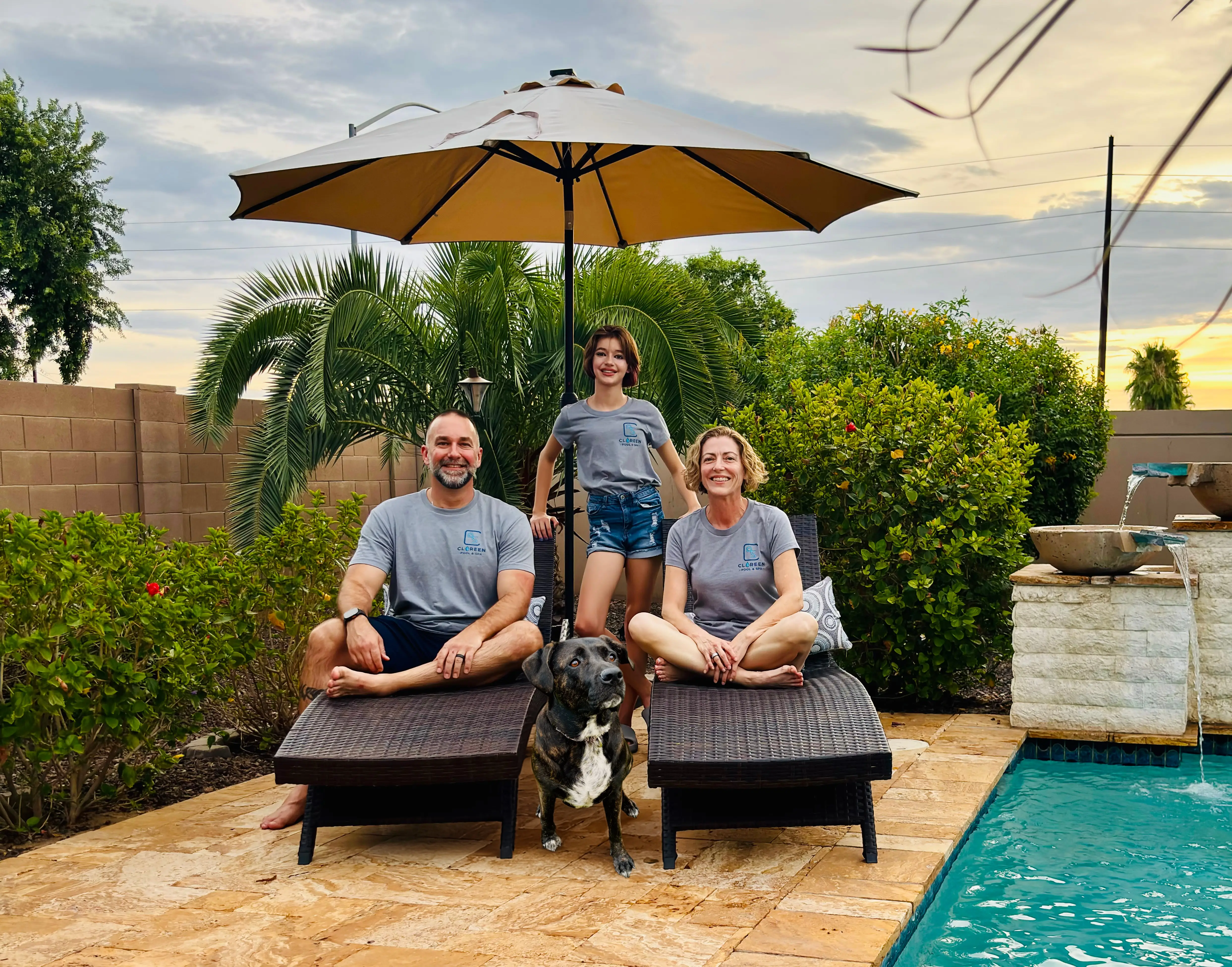 Scott, Sage, and Tina Clore with their dog Hazel, the family behind Cloreen Pool & Spa